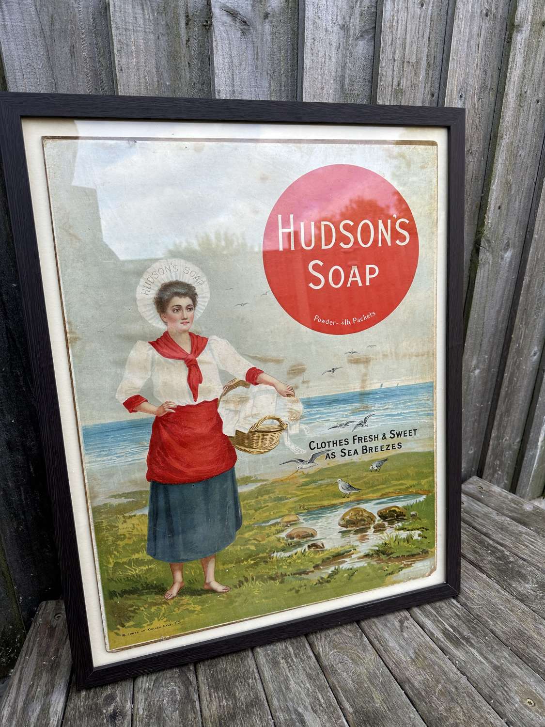 Lovely early Hudson soap advertising showcard with the washer woman
