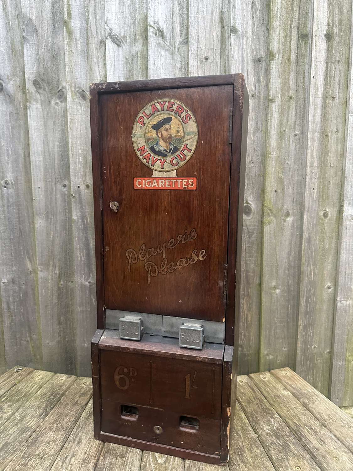 Players advertising wooden vending machine
