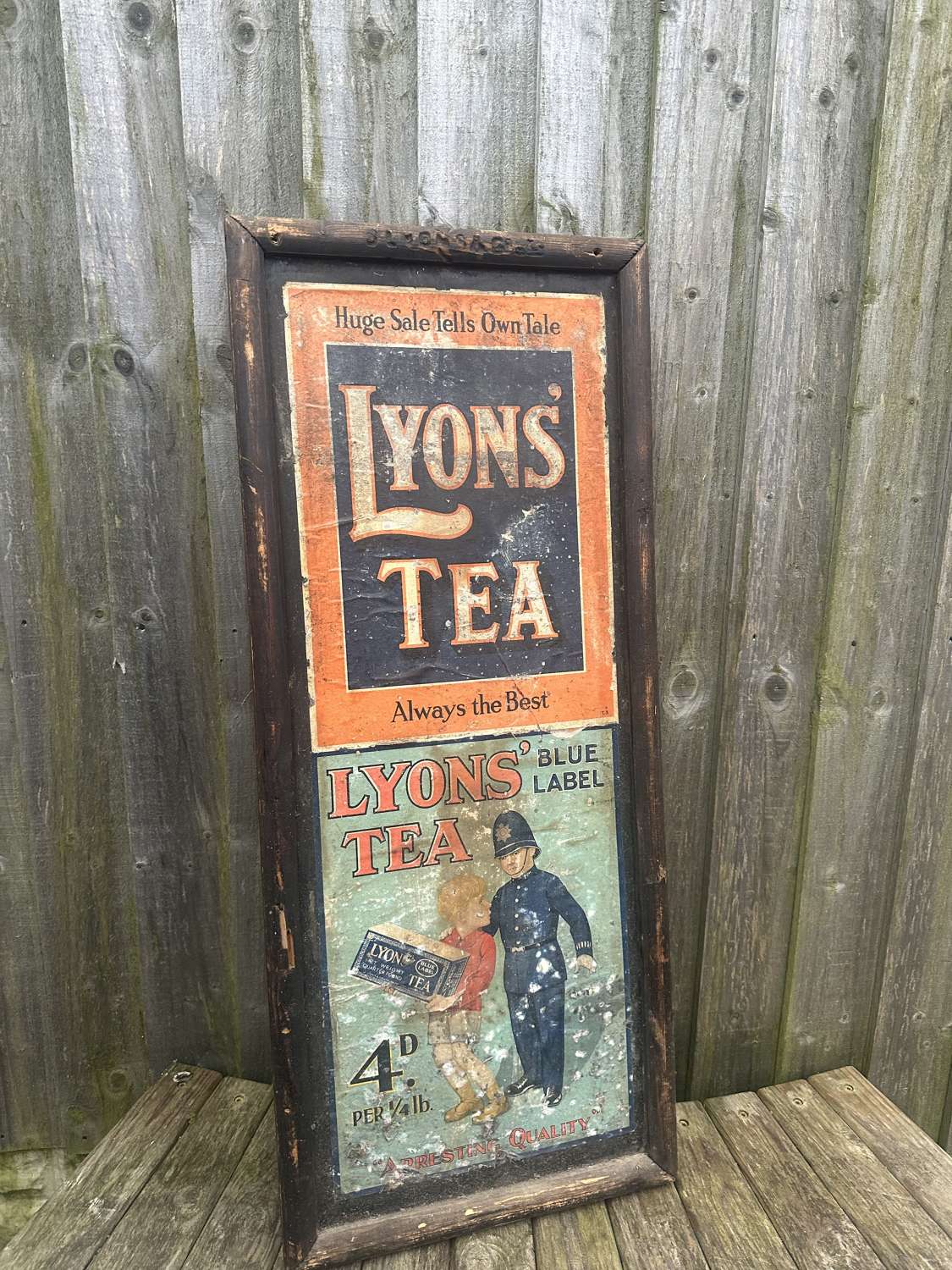 Old shop advertising board Lyons tea