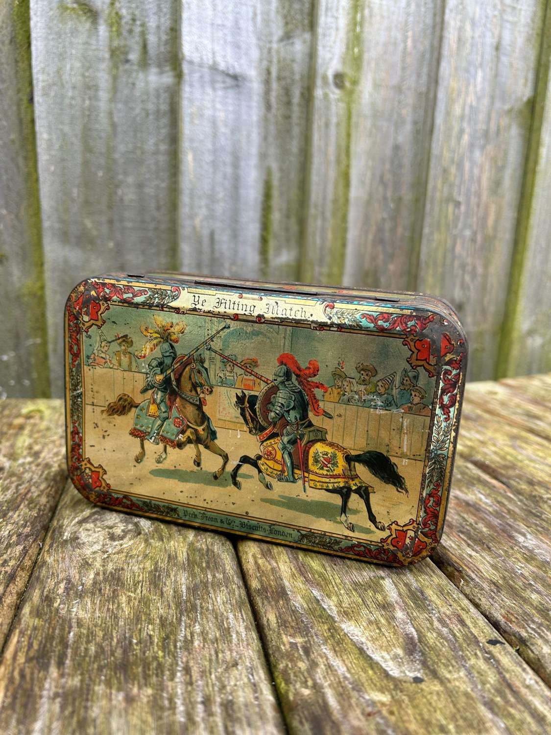 Early Peek freans jousting biscuit tin