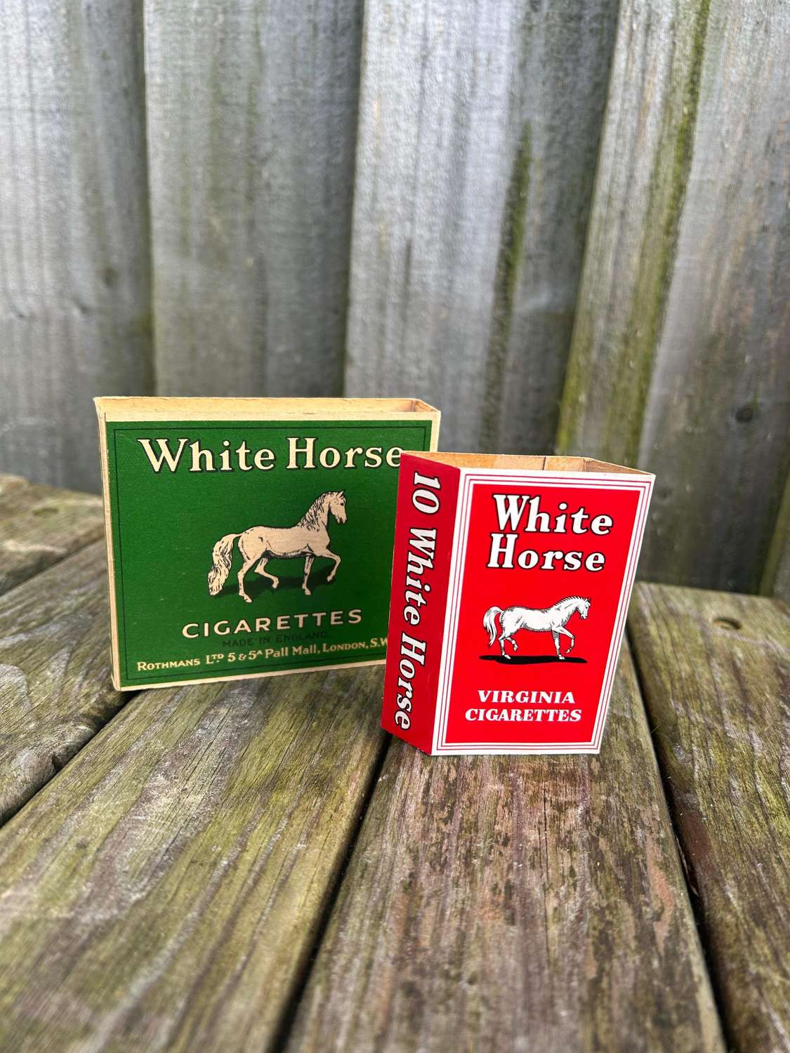 Pair of white horse cigarette packets