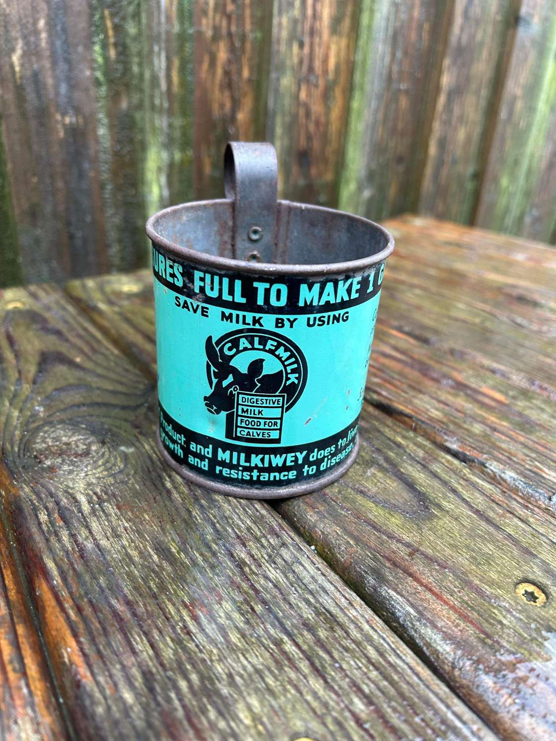 Lovely calfmilk advertising tin measuring scoop