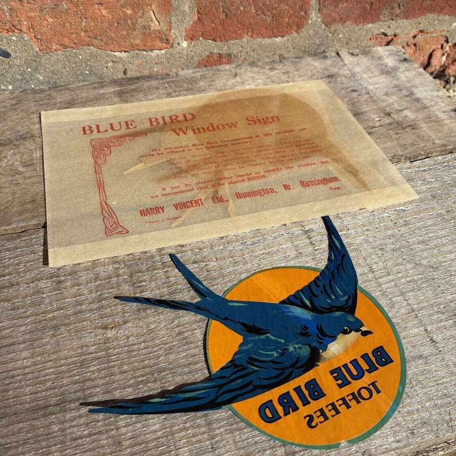 Scarce blue bird toffee window display