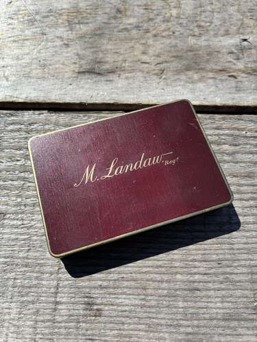M Landaw Ltd cigarette tin complete with the contents