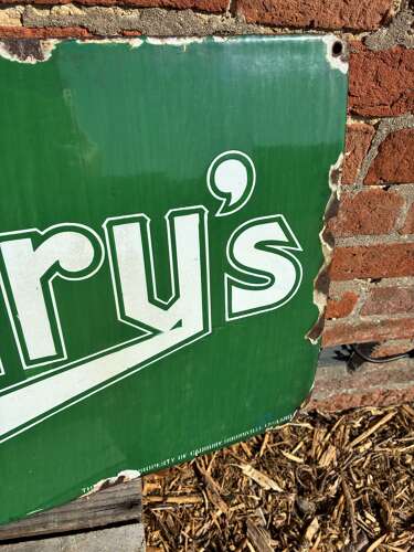 Green Cadburys cocoa enamel advertising sign