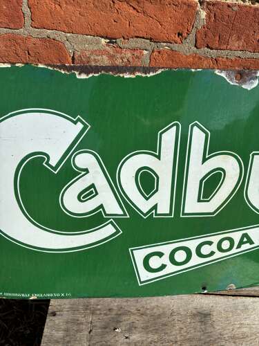 Green Cadburys cocoa enamel advertising sign