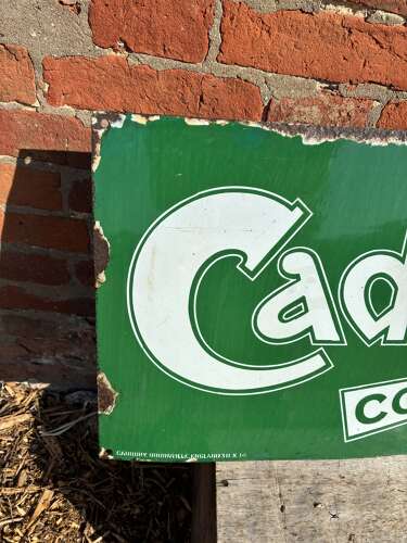 Green Cadburys cocoa enamel advertising sign