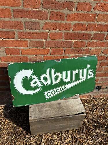 Green Cadburys cocoa enamel advertising sign